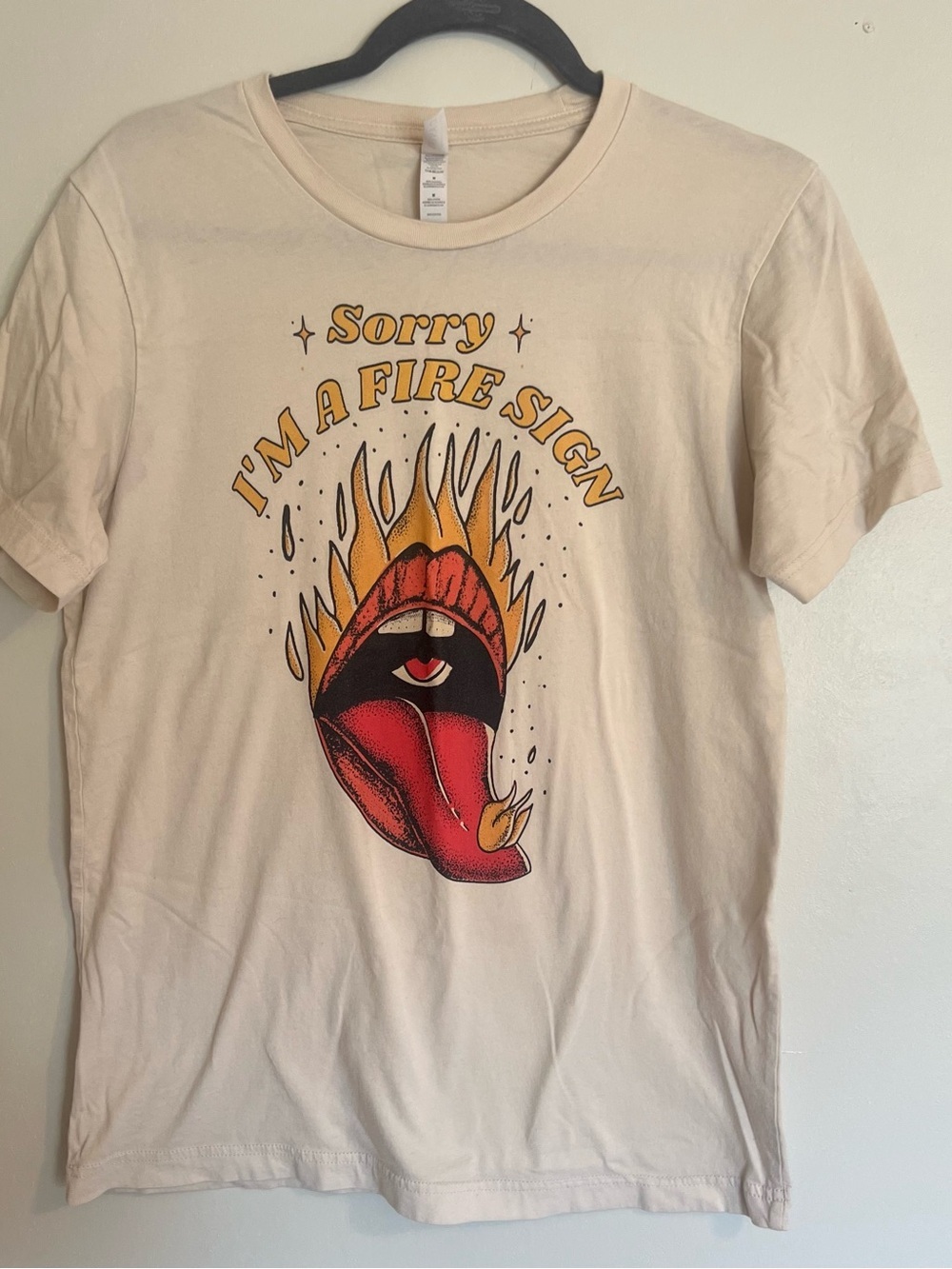 Sorry I'm a Fire Sign Graphic Tee - Cream with Red & Yellow Print Leo